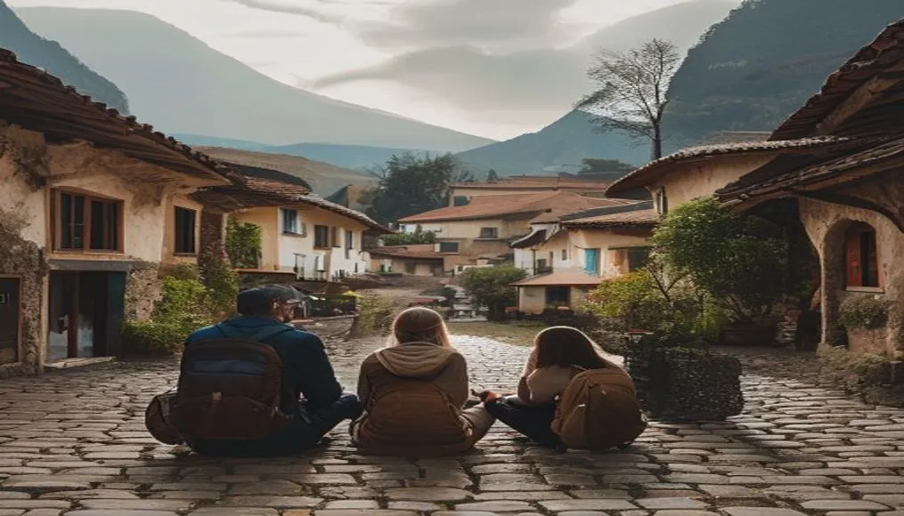 Travelers sharing a quiet moment in a village square