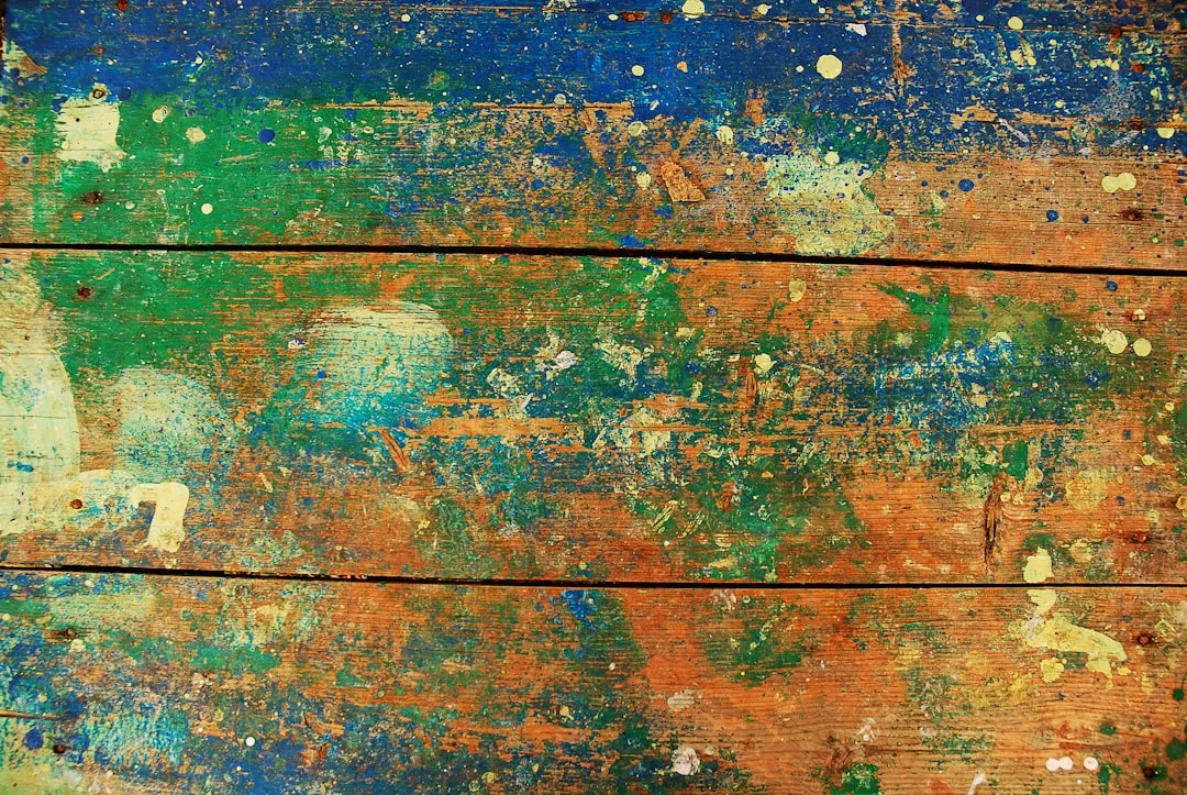 Samples of popular 2026 paint swatches arranged on a wooden surface