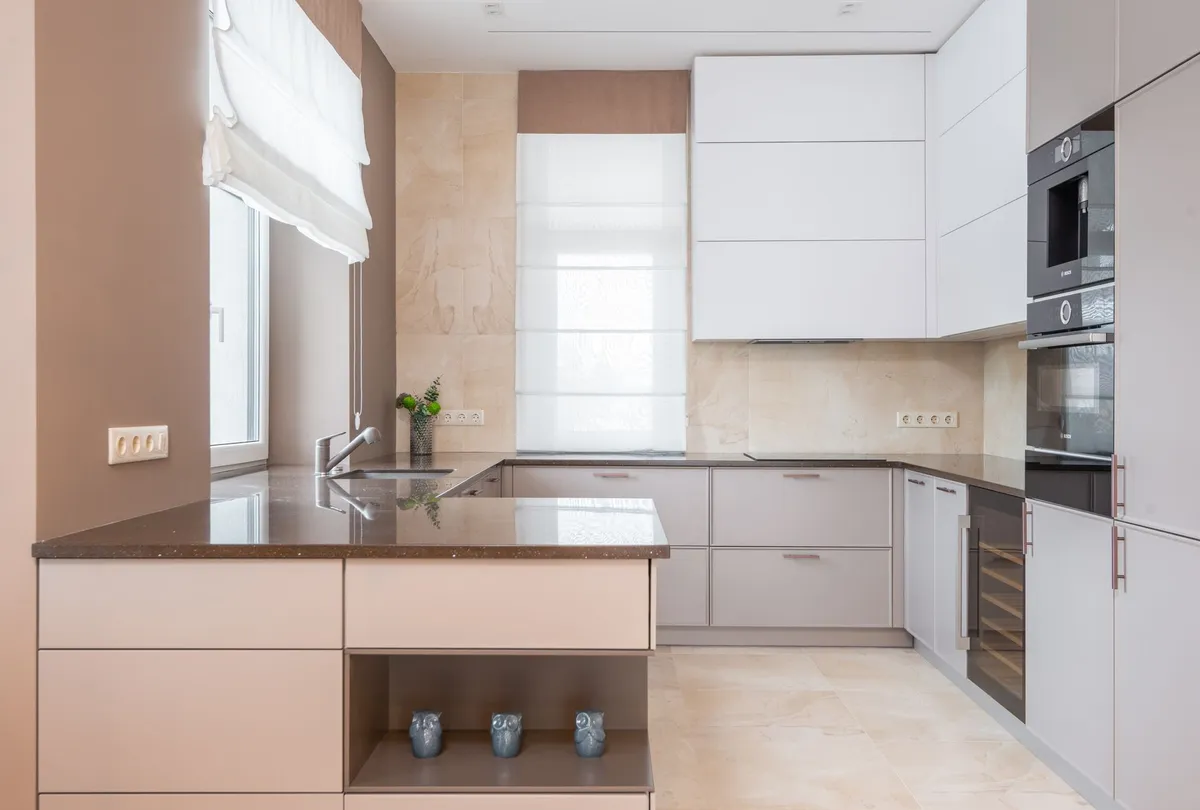 Sleek adhesive wall organizer in a modern kitchen